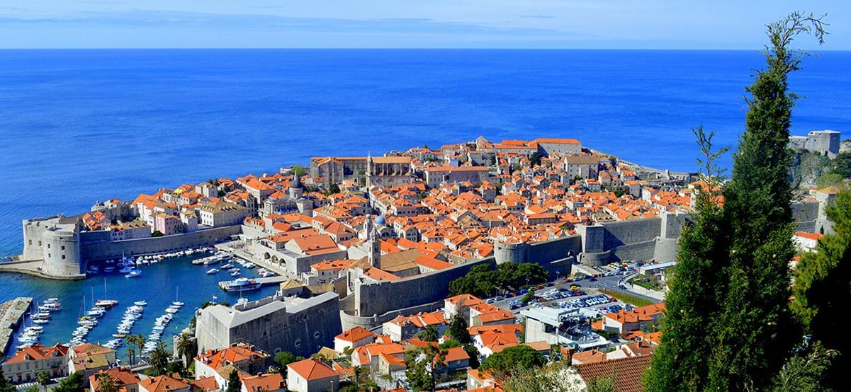 View of oceanside villas during luxury international culinary vacation in Croatia