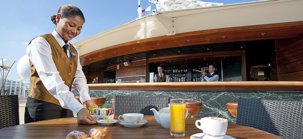 Breakfast on the sundeck onboard MSC Seaside cruise during luxury family vacation