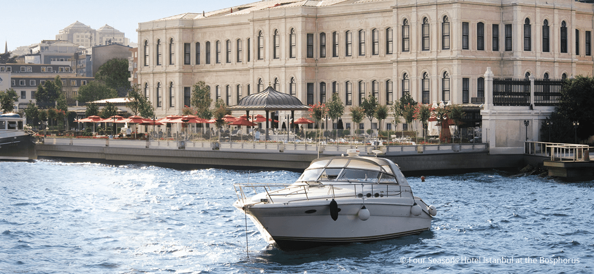 View of boat docking at the Four Seasons Hotel Istanbul during luxury international vacation to Turkey